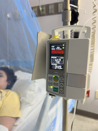 IV machine with screen display in hospital room close up viewの写真素材