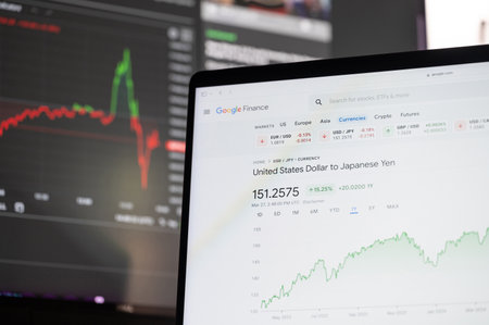 New York, USA - March 27, 2024: USD to JPY exchange on google finance in laptop screen online serviceのeditorial素材