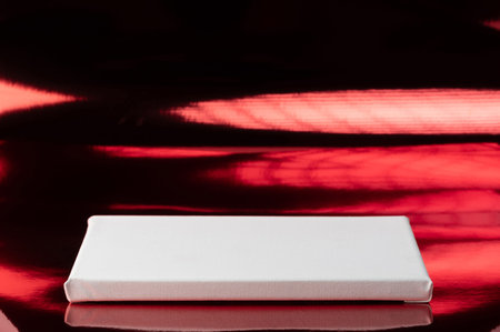 White block base rectangle shape on red studio background