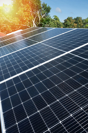 Solar panel array installation on top of house roof