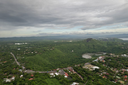 Central America Nicaragua country destination aerial drone panorama view on road around green mountainsの写真素材
