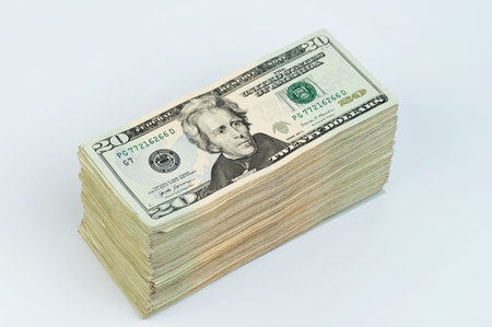 Big pile of USA dollaras banknote perspective view isolated on white studio background