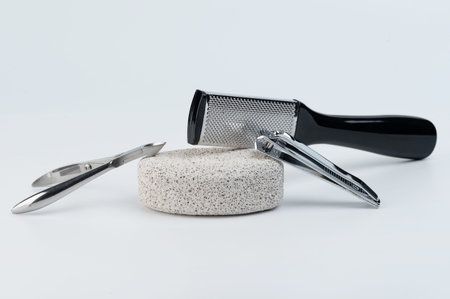 Close up of men pedicure tool isolated on white studio backgroundの写真素材