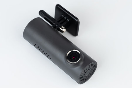 Black dashboard car camera isolated close up view