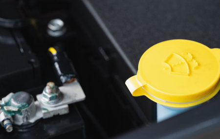 Water washer cap in modern car close up view