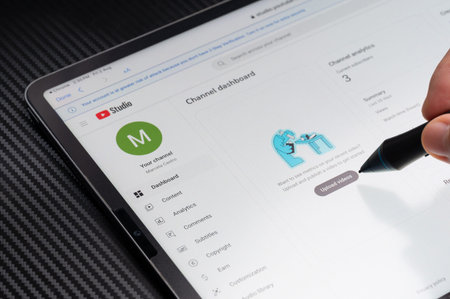 New York, USA - August 2, 2024: Youtube channel dashboard on tablet screen macro close up view