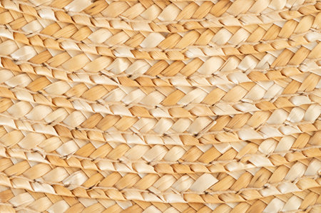 Knit straw brown yarn texture background close up view