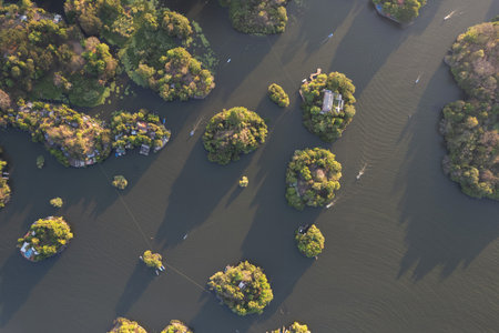 Green tropical islands above top view on sunset light