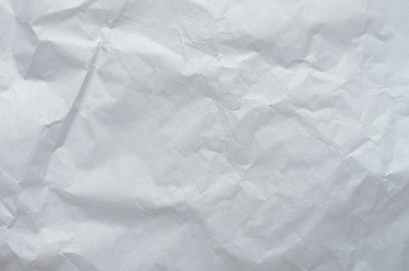 Textured white paper adds depth and character, ideal for crafts, designs, and artistic projects.の写真素材