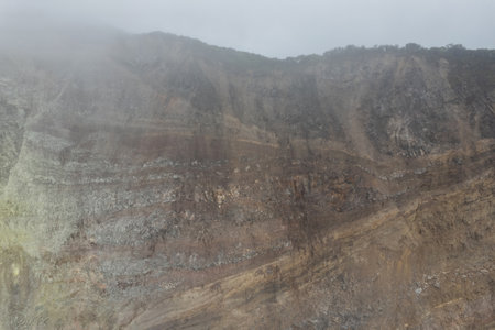 Rock volcano crater hill brown color with different layersの写真素材