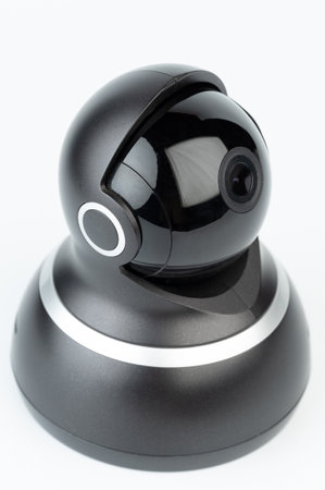 Black security camera perspective view isolated on white studio backgroundの写真素材