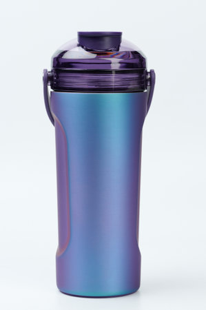 Blue metal shaker bottle front view isolated on white studio backgroundの写真素材