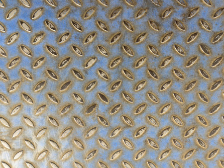 Corroded metal pattern with relief rombus close up viewの写真素材