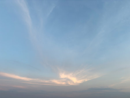 Dramatic sunset sky background with transparent cloudsの写真素材