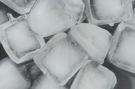 Ice cubes abstract texture background macro close up viewの写真素材