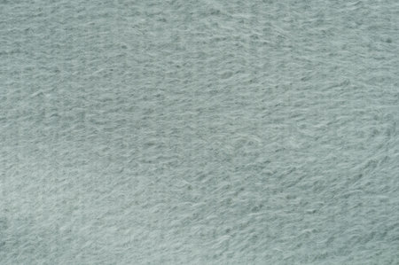 Close-up view of delicate, fluffy texture in pale gray, perfect for design projects and backgrounds.の写真素材