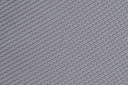 Close-up view reveals detailed woven textile with subtle pattern, emphasizing its soft color and texture.の写真素材