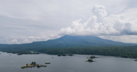 Islands in Nicaragua lake with mombacho volcano background aerial drone viewの写真素材