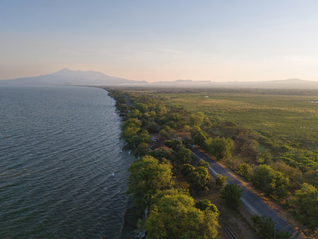 Sunset over Nicaragua landscape with Mombacho volcano aerial drone viewの写真素材
