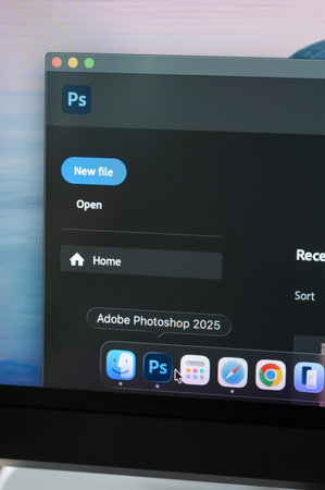 New York, USA - March 10, 2026: Start Adobe photoshop application on computer screen close up macro...