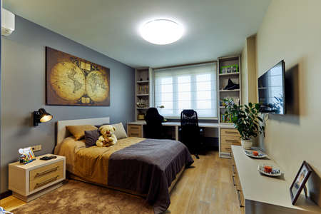 MINSK, BELARUS - DECEMBER 21, 2018: Interior of the modern bedroom in loft flat in light color styleのeditorial素材