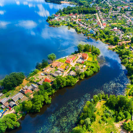 Islands, villages among the water from the airの写真素材