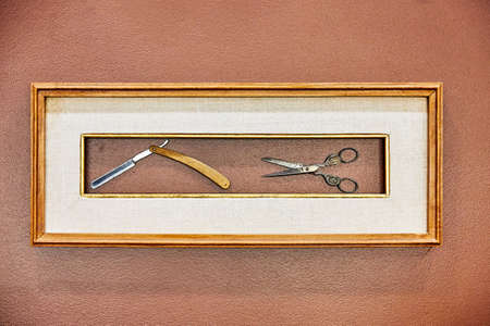 dangerous razor and scissors in the frameの写真素材