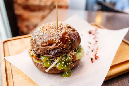 Veggie beet and quinoa burger with avocadoの写真素材