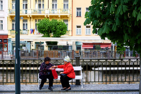 Karlovy Vary, Czech republic - April, 1, 2018: People walking along Hot springs colonnade in Karlovy Vary. Karlovy Vary historically famous for its hot springsのeditorial素材