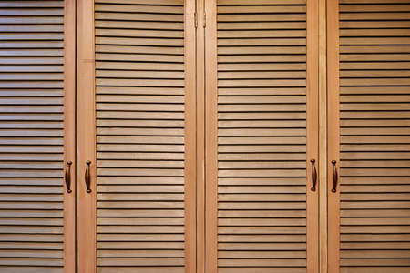 Rustic brown wooden window shutters, wall backgroundの写真素材