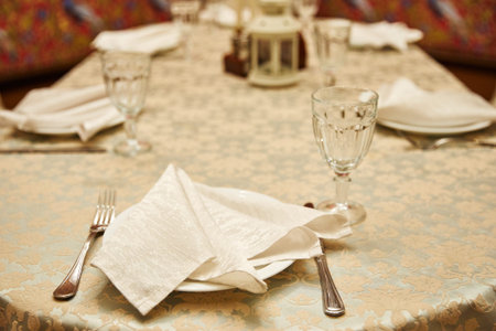 metal fork and knife on wooden table