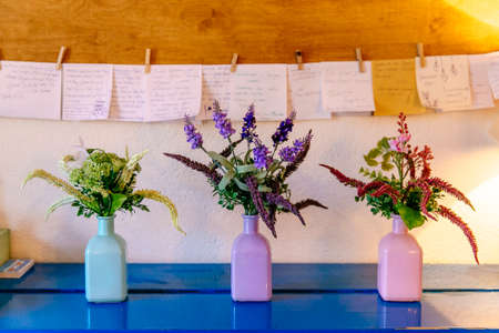 3, three, Beautiful field bouquet of flowers in a vase on the tableの写真素材