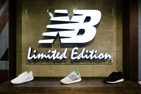 MADRID, SPAIN - SEPTEMBER 9 2018: New Balance athletic shoes on a sports shop counterのeditorial素材