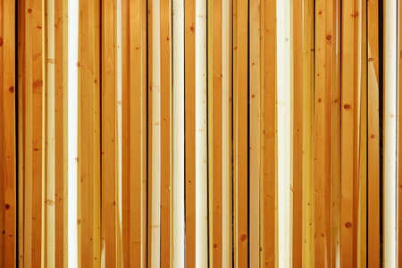 Wood slats, timber battens wall pattern surface texture. Close-up of interior material for design decoration backgroundの写真素材