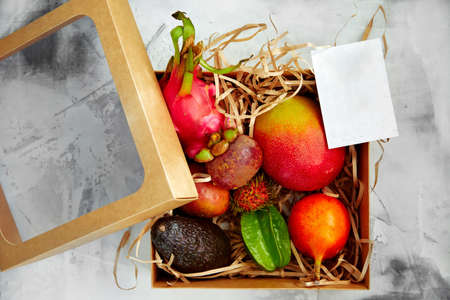 Exotic fruits box for concept design. Diet nutrition concept. Papaya tropicalの写真素材