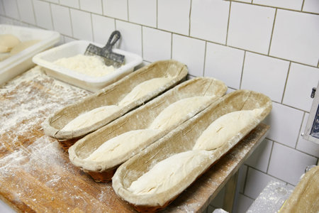 pieces of dough in a row in a bowl, pastries, flour products, close-up