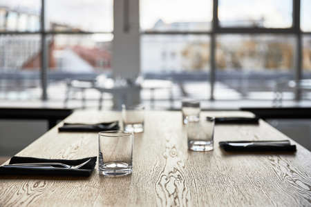 An empty glass on a tableundefinedの写真素材