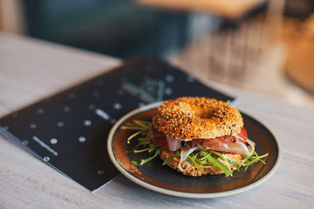 Bagel with Roast Beef on the plateの写真素材
