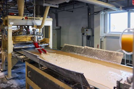 Moscow, Russia, 02.05.2020, Production line of gypsum board for construction. Plant for the production of construction materialsのeditorial素材