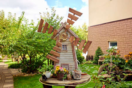 Old windmill at green fieldの写真素材