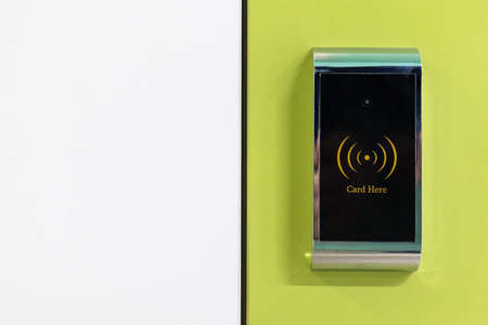 electromagnetic lock, card access system on a yellow-and-white backgroundの写真素材