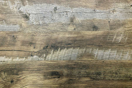 Texture of a wooden wall with gray and white stains, background, wood material.の写真素材