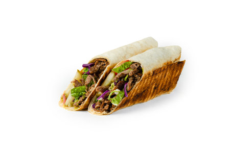 shawarma with beef, lettuce and tomato cut on a white backgroundの写真素材