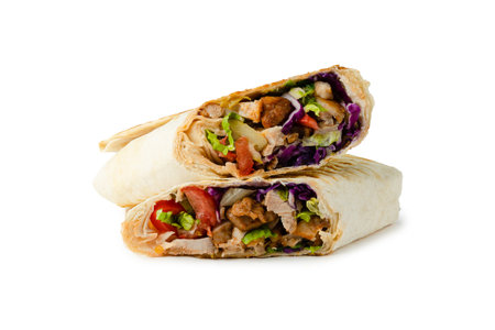 shawarma with chicken, lettuce and tomato cut on a white backgroundの写真素材