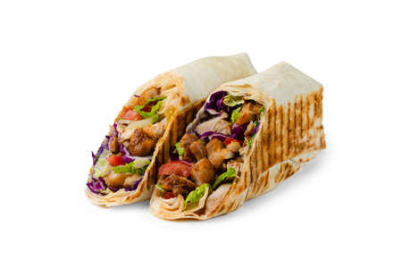 shawarma with chicken, lettuce and tomato cut on a white backgroundの写真素材