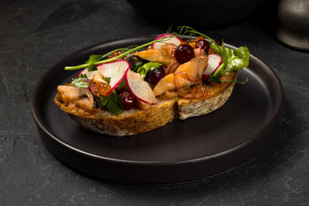 Toast with delicious sugudai and fresh vegetables on plate