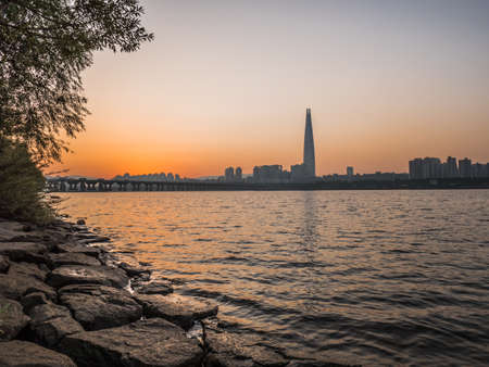 Sunrise in Seoul. Beautiful sky behind city, tower and bridge. Nature backgroundの写真素材
