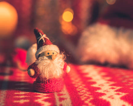 Christmas toys with Santa on holiday table. Decoration for New Year 2020の写真素材