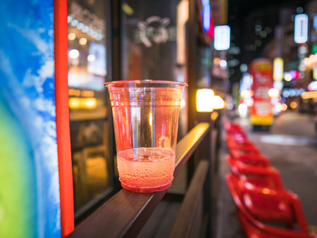 SEOUL / SOUTH KOREA - 08.18.2019: Plastic cup on the streets with lights