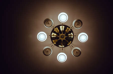 Closeup of chandelier hanging on the ceilingの写真素材